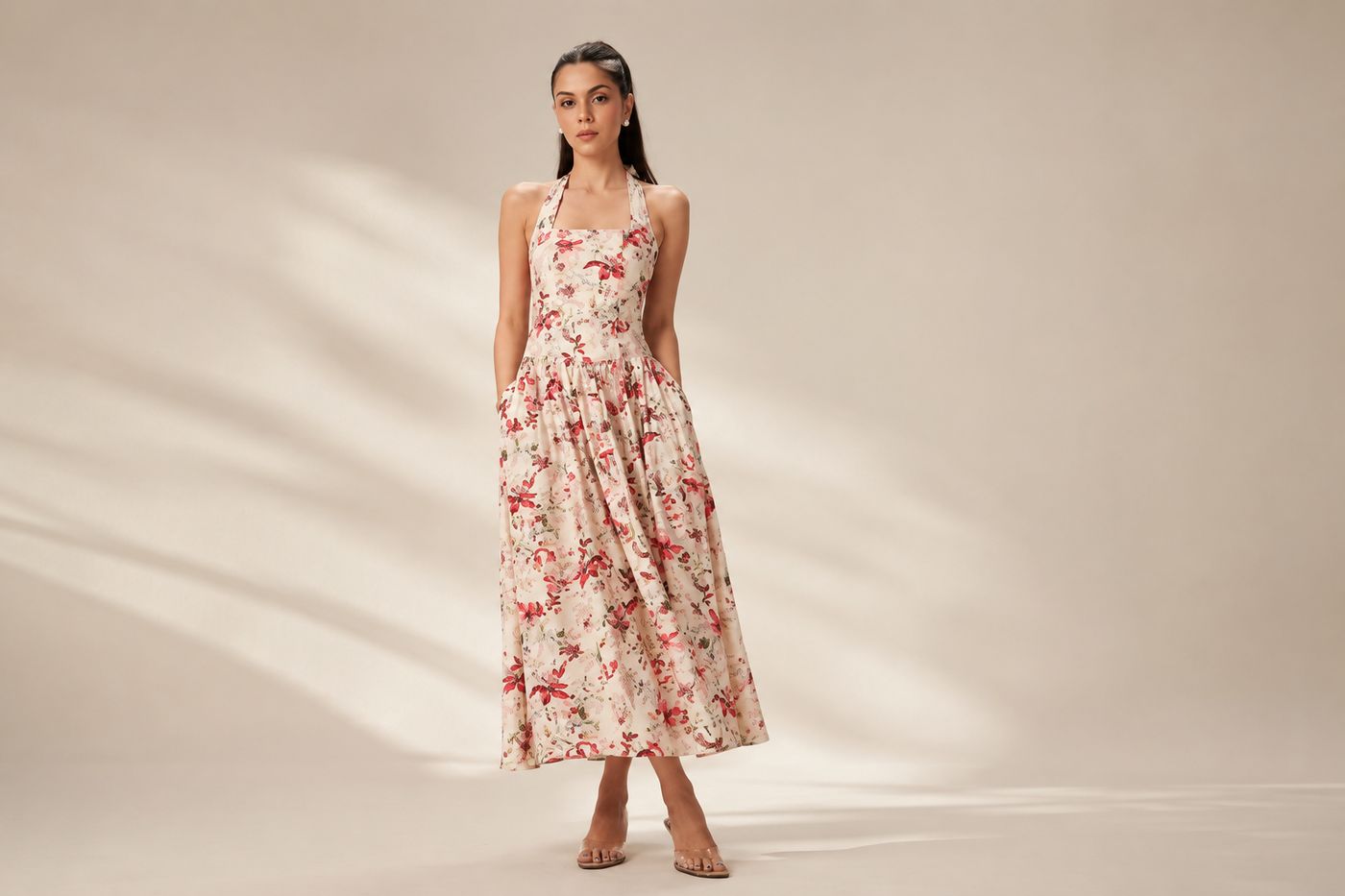 Nira drop-waist halter dress in floral print — developed by THELYSH Atelier