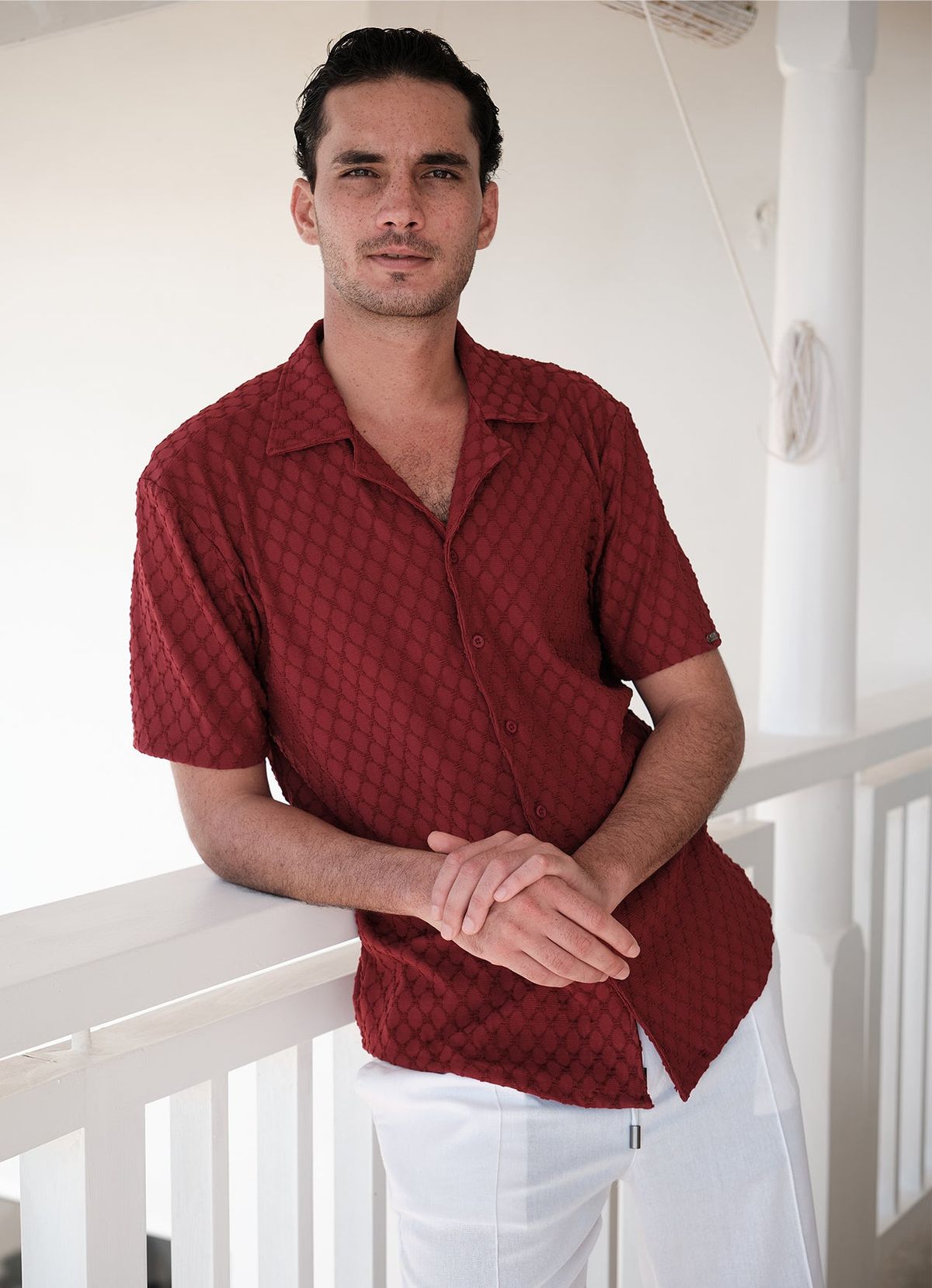 Resort collar shirt in textured burgundy — part of a menswear shirting capsule developed by THELYSH Atelier